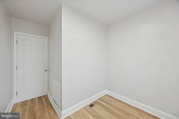 a view of small space with wooden floor