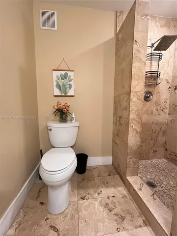 a view of balcony with furniture