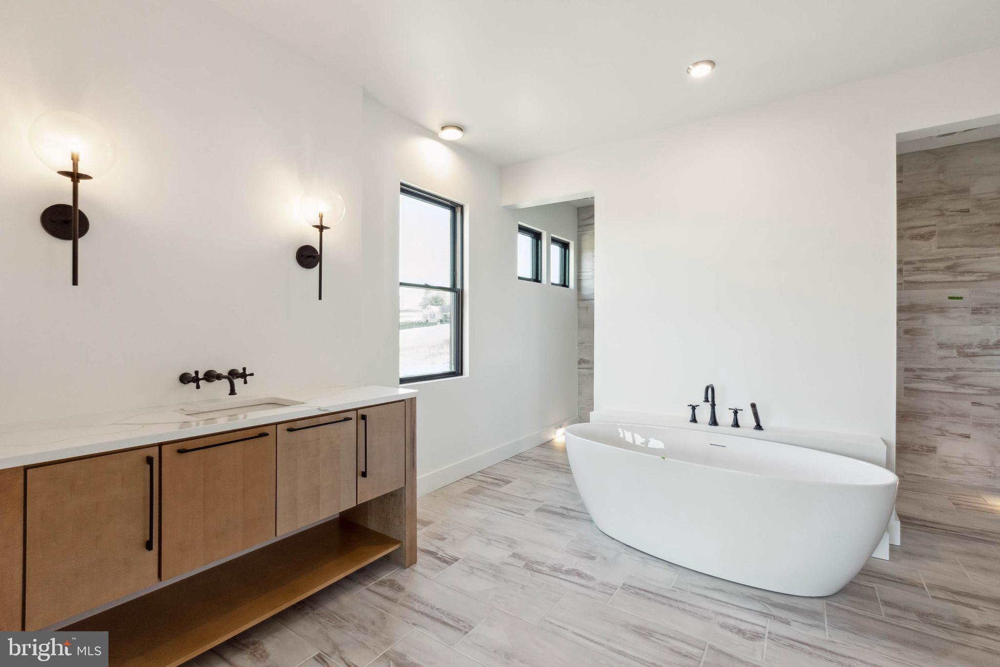 4362 Brubaker Way, Unit (LOT 5) Ijamsville, MD 21754 - Photo 23 of 37 Luxury primary bathroom with soaking tub.