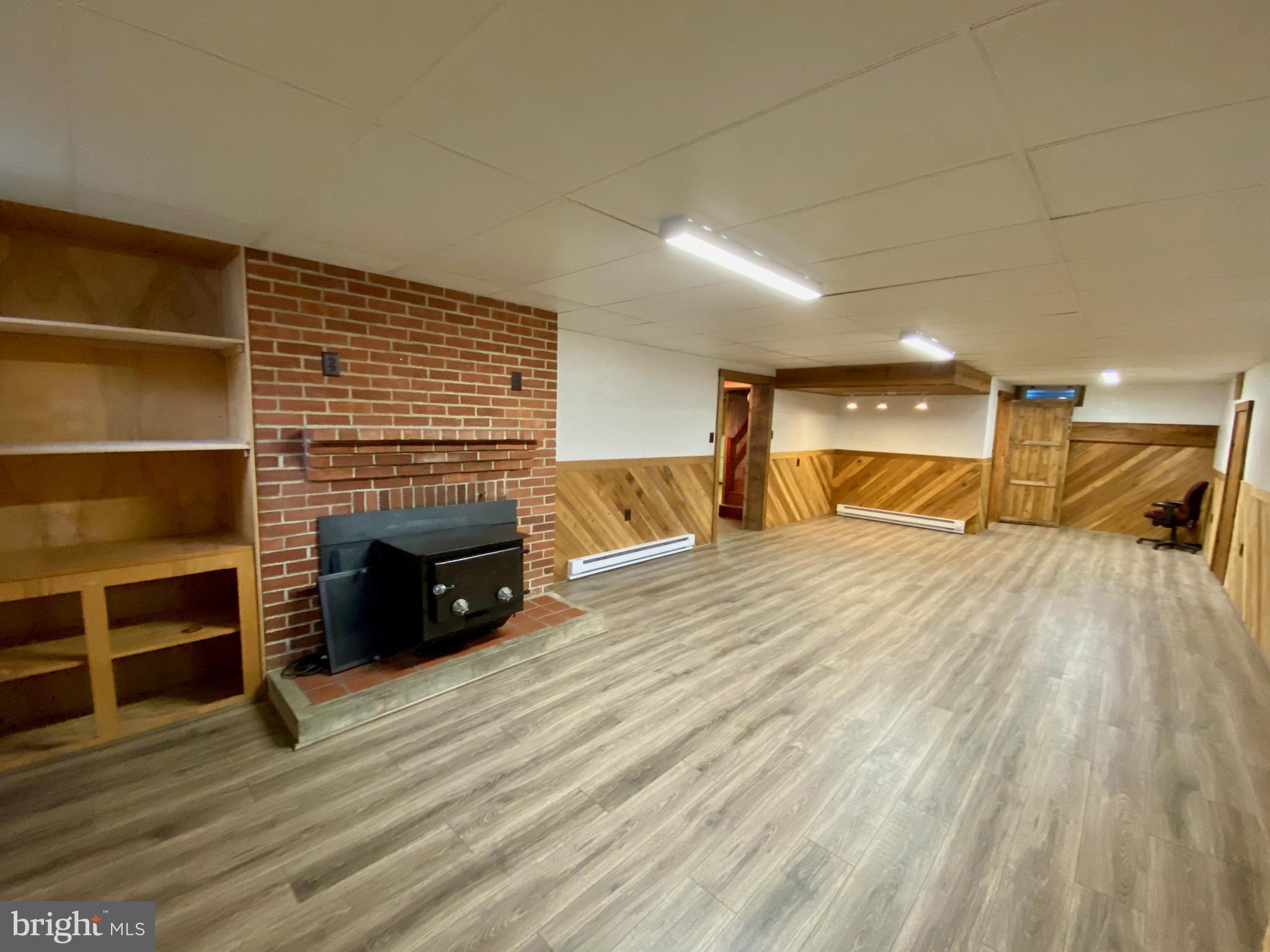 1250 Tower Road York, PA 17406 - Photo 23 of 48 Family Room with Wood Stove & Built-in's