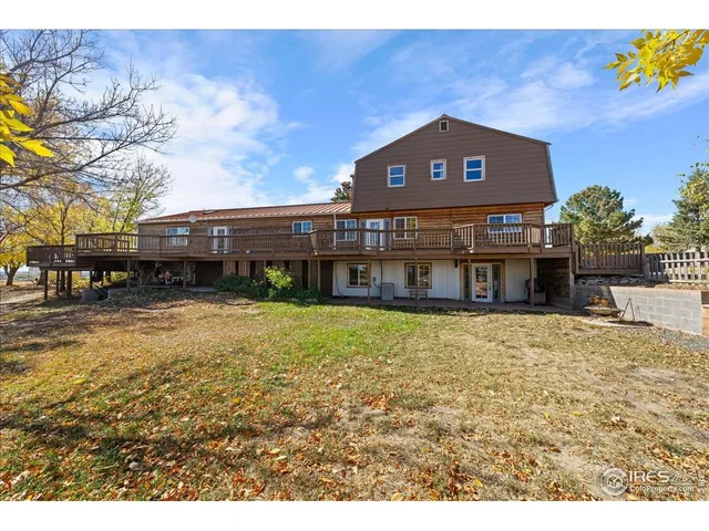 a view of a backyard of the house