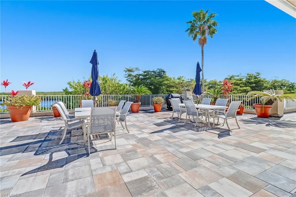 410 Bayfront Place, Unit 2405 Naples, FL 34102 - Photo 16 of 22 a view of a terrace with chairs