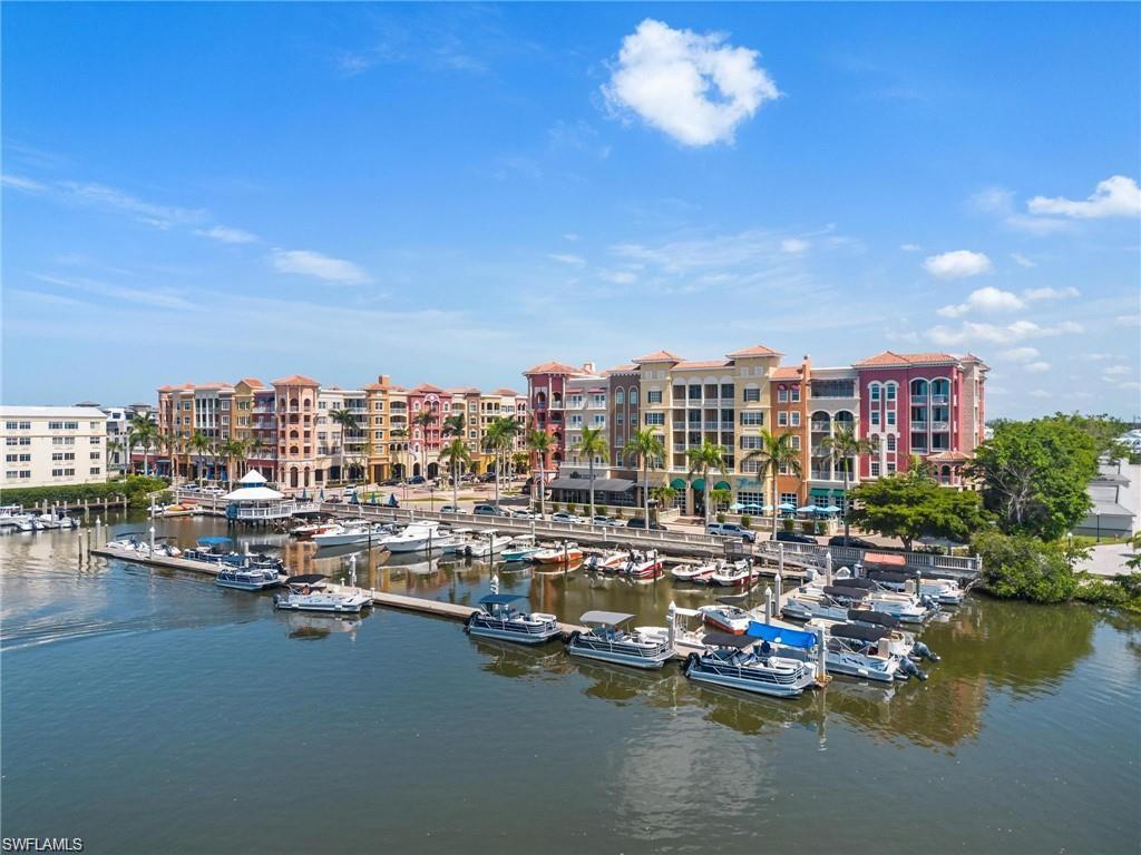 410 Bayfront Place, Unit 2405 Naples, FL 34102 - Photo 22 of 22 a view of a lake with tall buildings