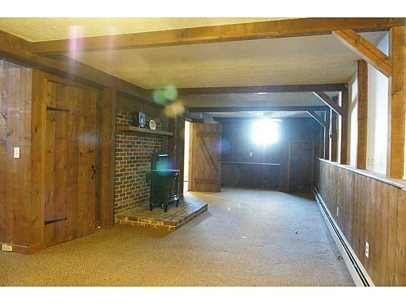 32 Hatfield Road Orrington, ME 04474 - Photo 15 of 20 Basement with propane heater.