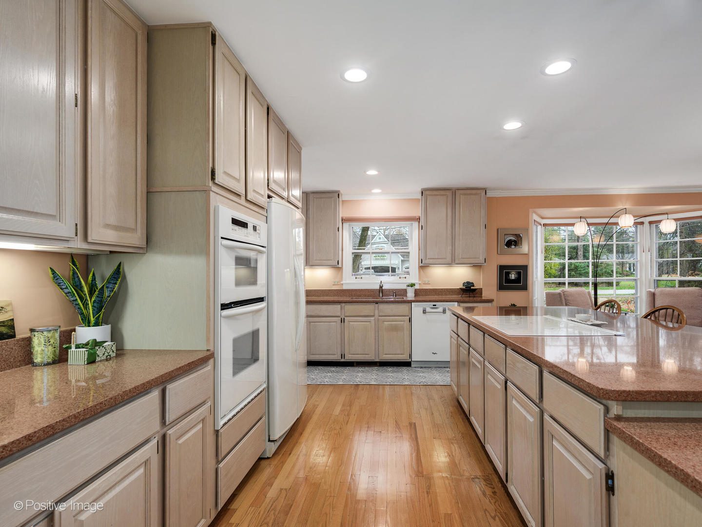 1520 Longvalley Road Glenview, IL 60025 - Photo 13 of 35 a kitchen with stainless steel appliances granite countertop lots of counter top space and cabinets