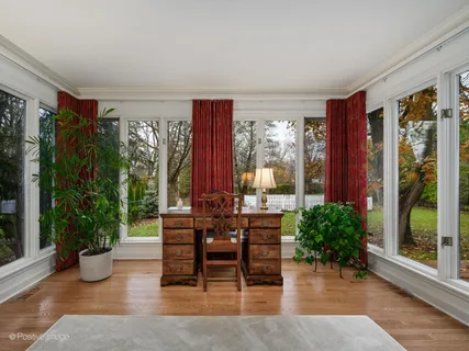 a view of a livingroom with furniture window and garden view