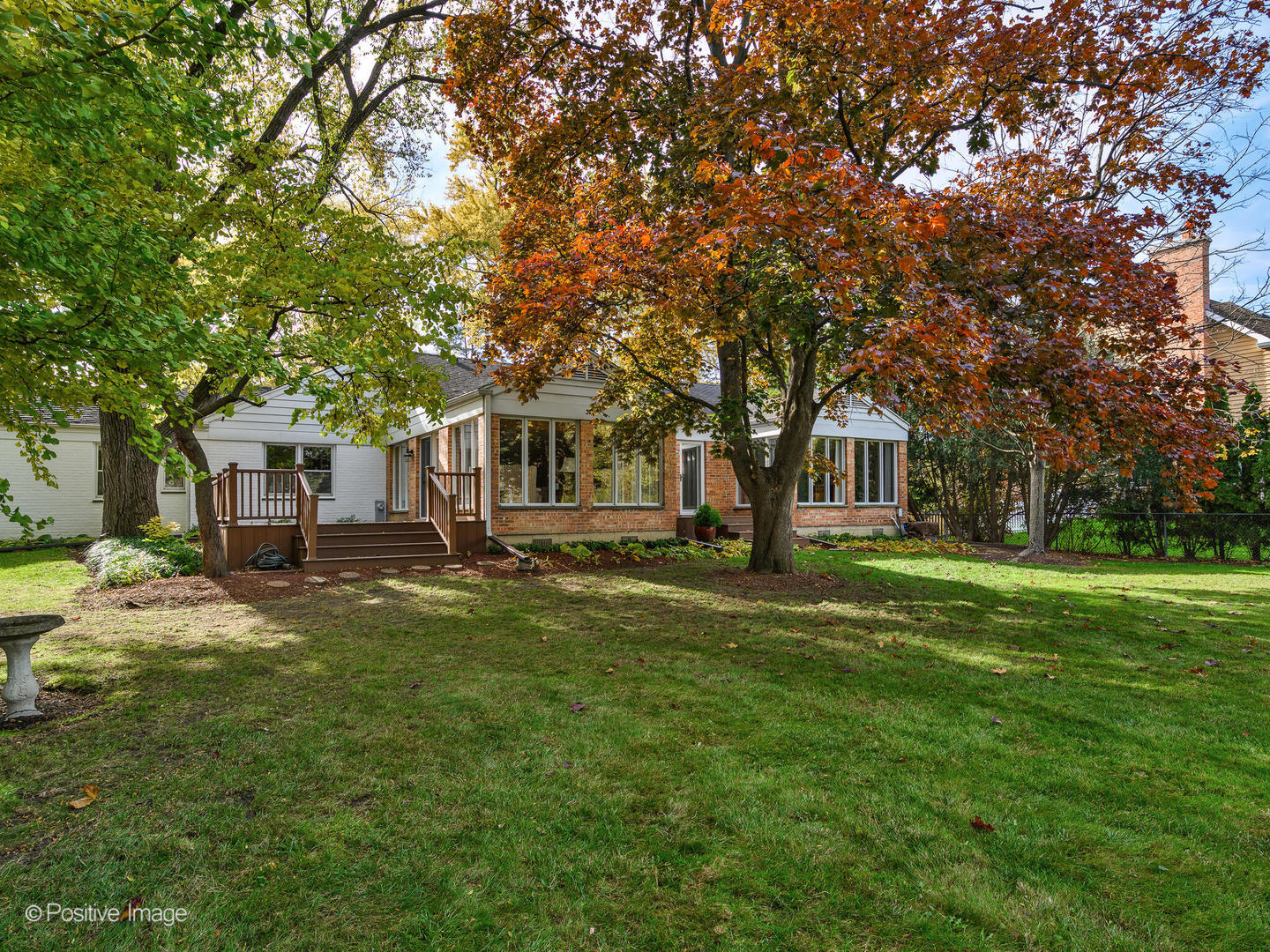 1520 Longvalley Road Glenview, IL 60025 - Photo 28 of 35 a front view of a house with a garden