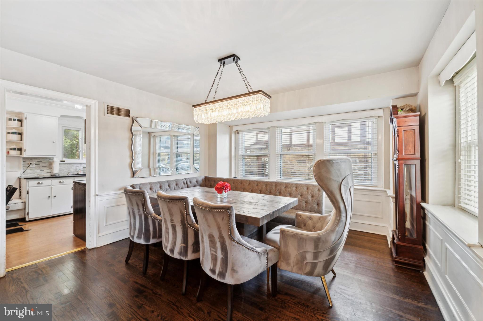 559 Broadview Road Upper Darby, PA 19082 - Photo 3 of 16 a dining room with furniture a chandelier and wooden floor