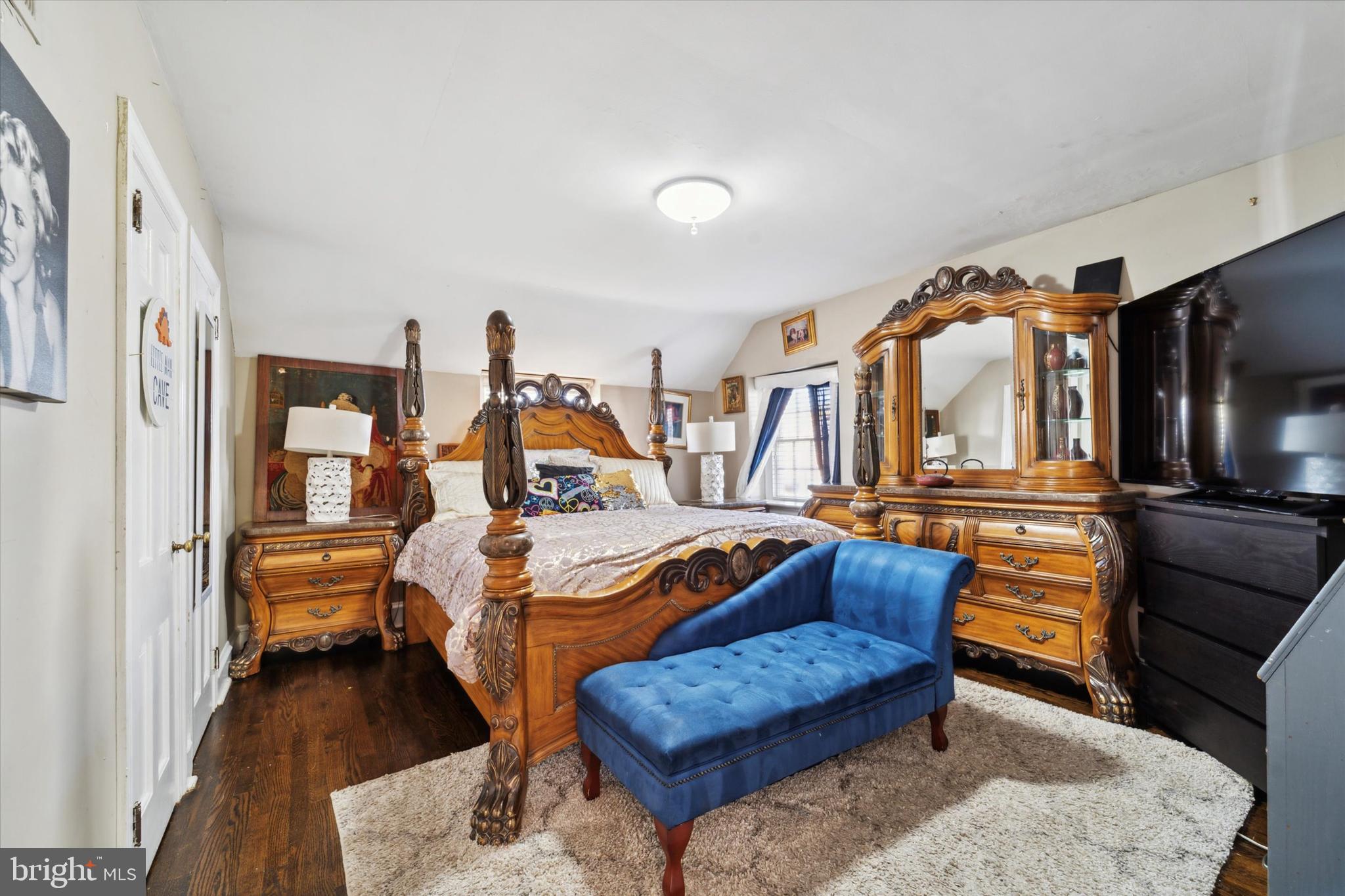 559 Broadview Road Upper Darby, PA 19082 - Photo 10 of 16 a bedroom with furniture and a wooden floor