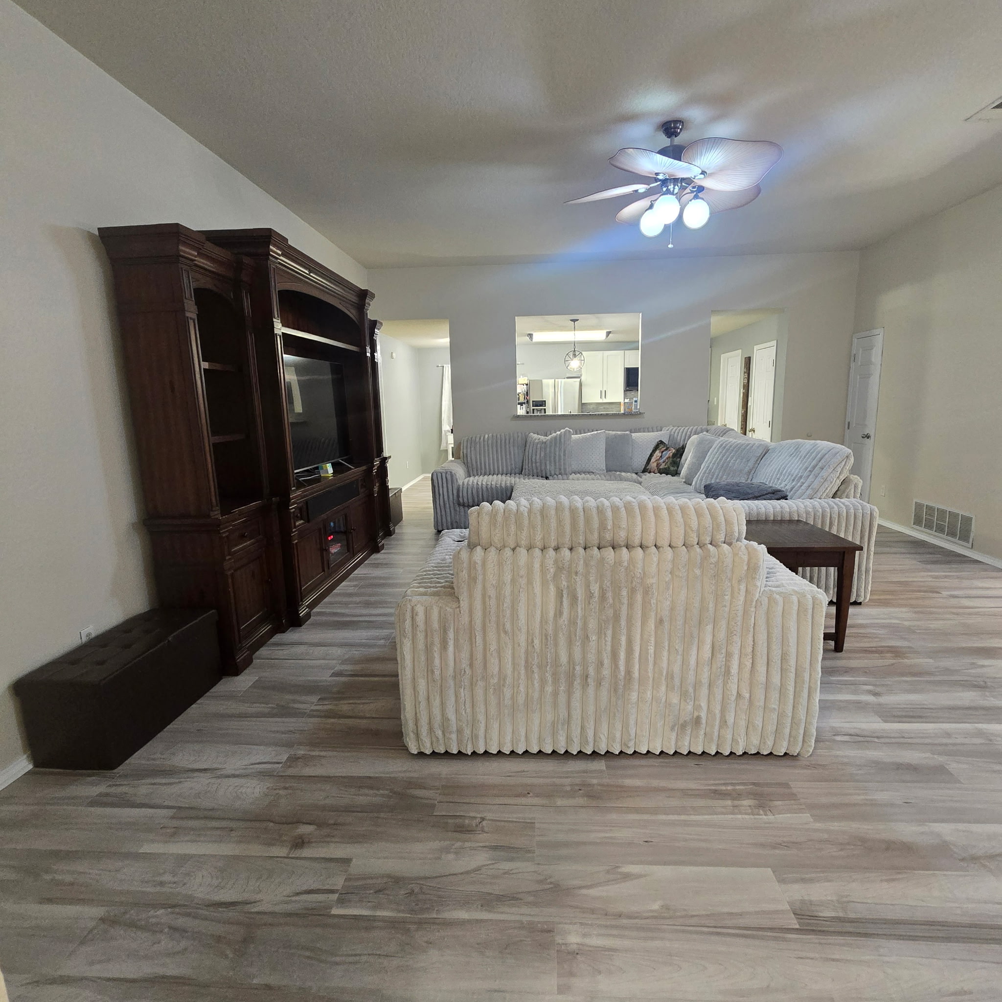 212 Druse Lane Jarrell, TX 76537 - Photo 21 of 39 a living room with furniture and a flat screen tv