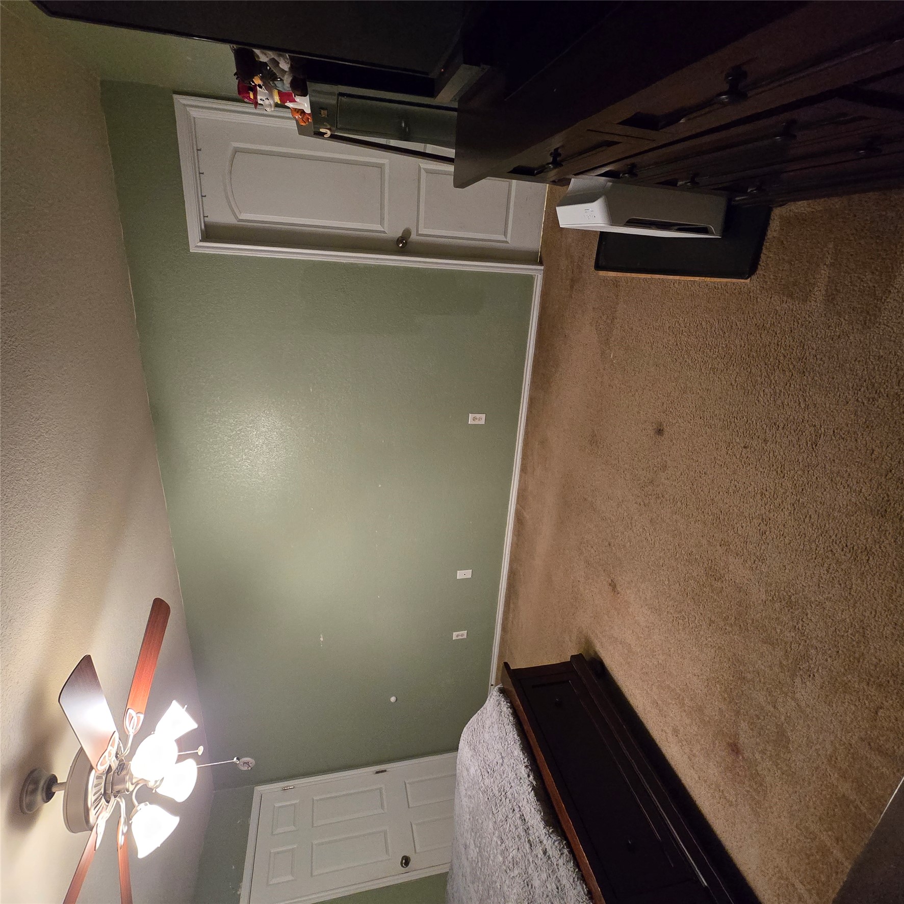 212 Druse Lane Jarrell, TX 76537 - Photo 26 of 39 a bedroom with a bed and a chandelier