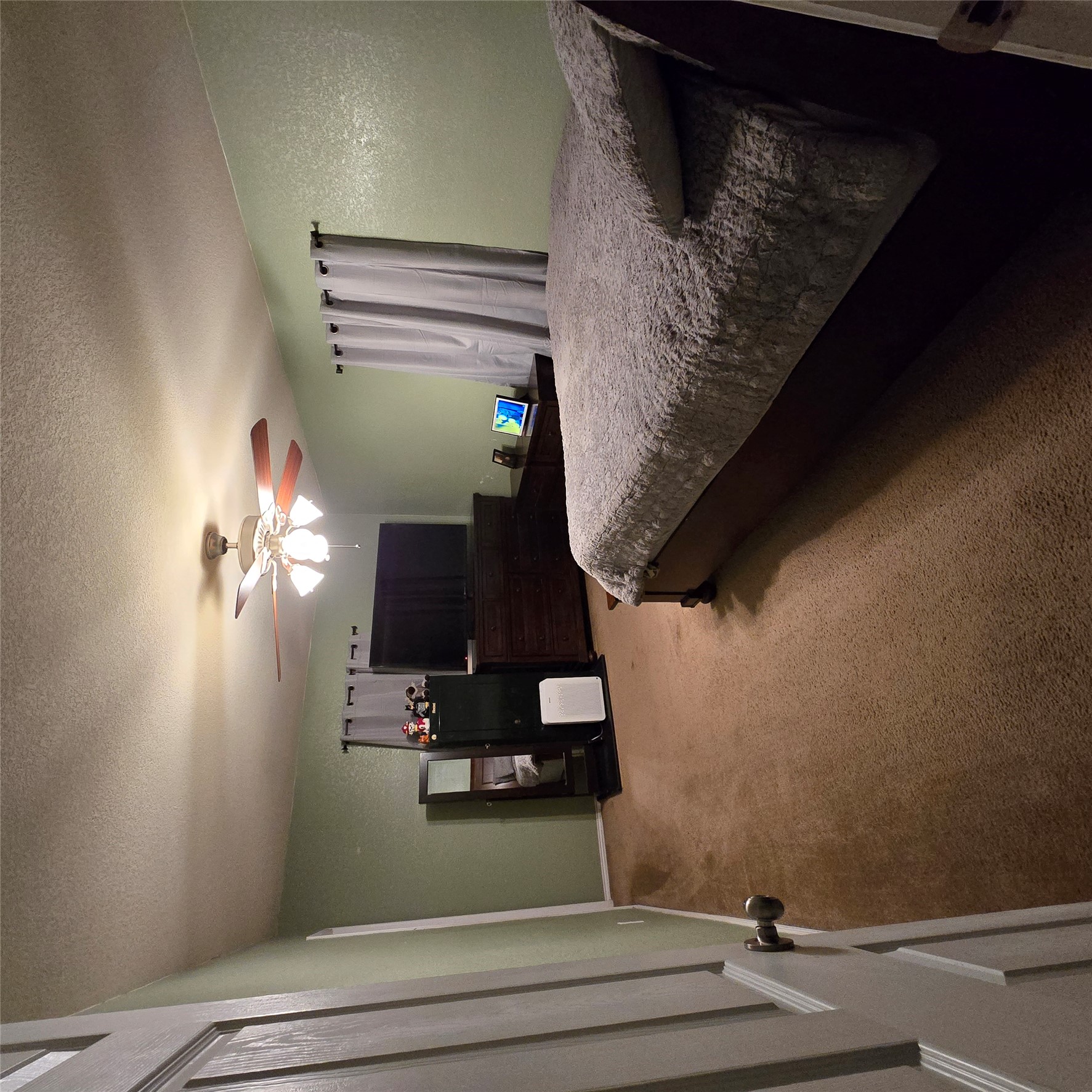 212 Druse Lane Jarrell, TX 76537 - Photo 27 of 39 a bedroom with a bed and a television