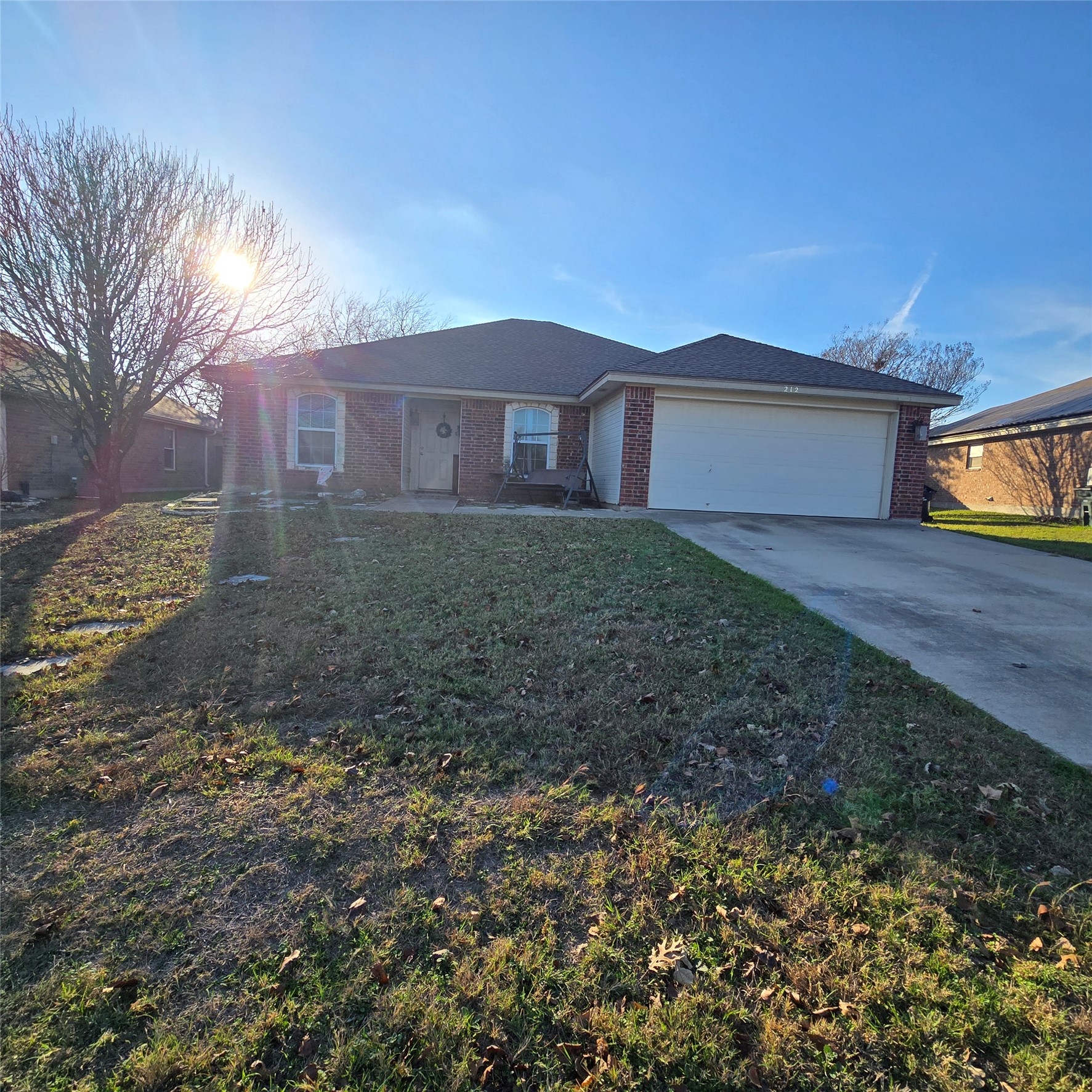 212 Druse Lane Jarrell, TX 76537 - Photo 3 of 39 a view of a house with a yard