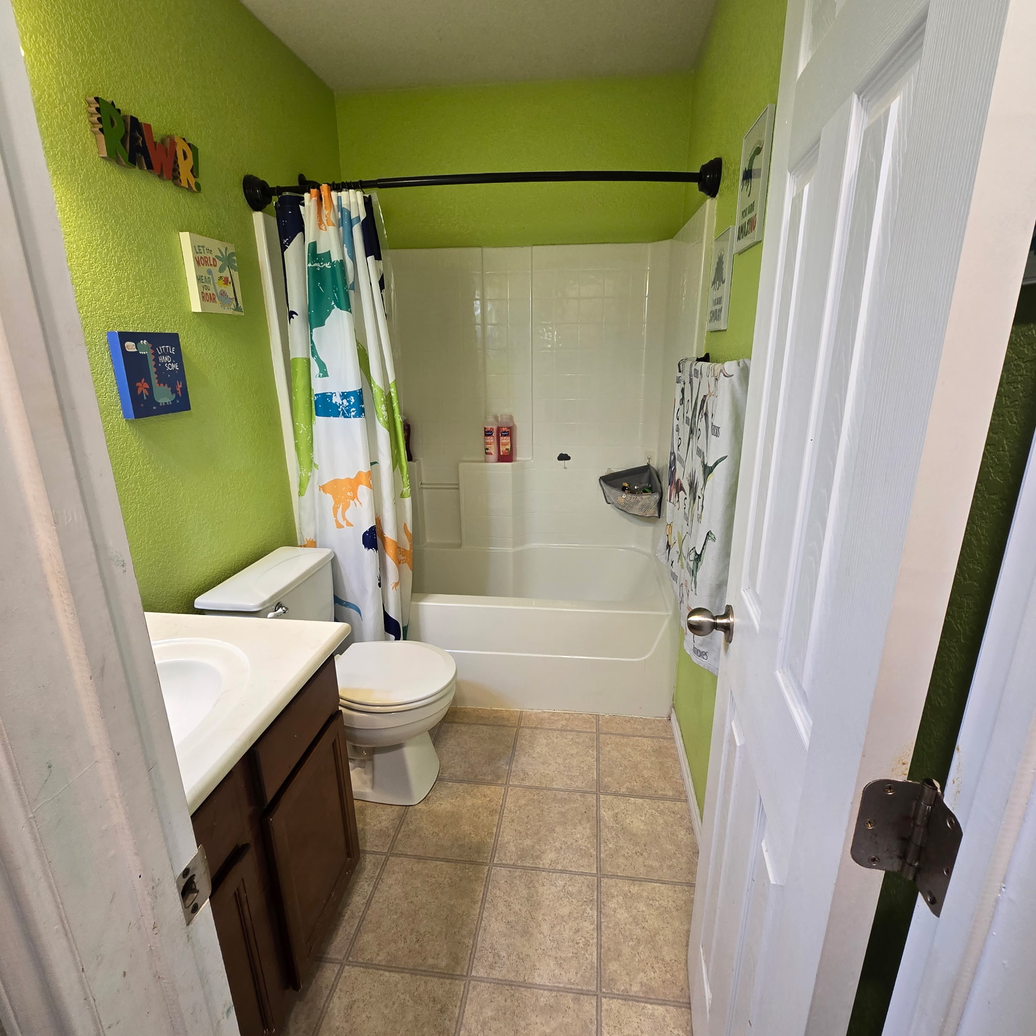 212 Druse Lane Jarrell, TX 76537 - Photo 32 of 39 a bathroom with a sink a toilet and a shower