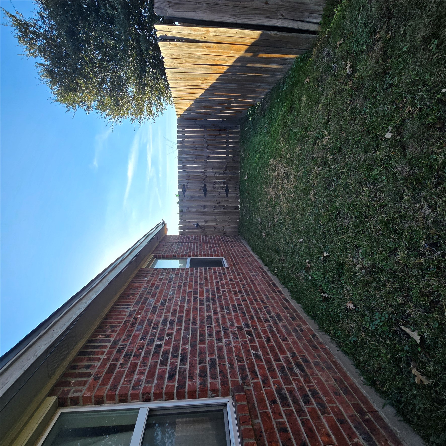 212 Druse Lane Jarrell, TX 76537 - Photo 7 of 39 a view of a backyard with wooden fence