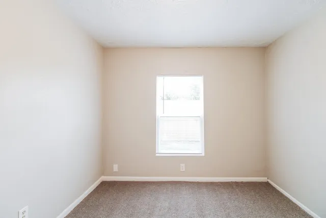 an empty room with a window
