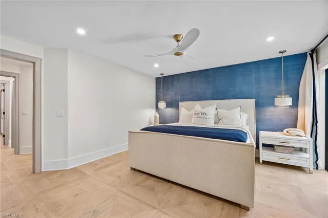 a bedroom with a bed and a view of bedroom