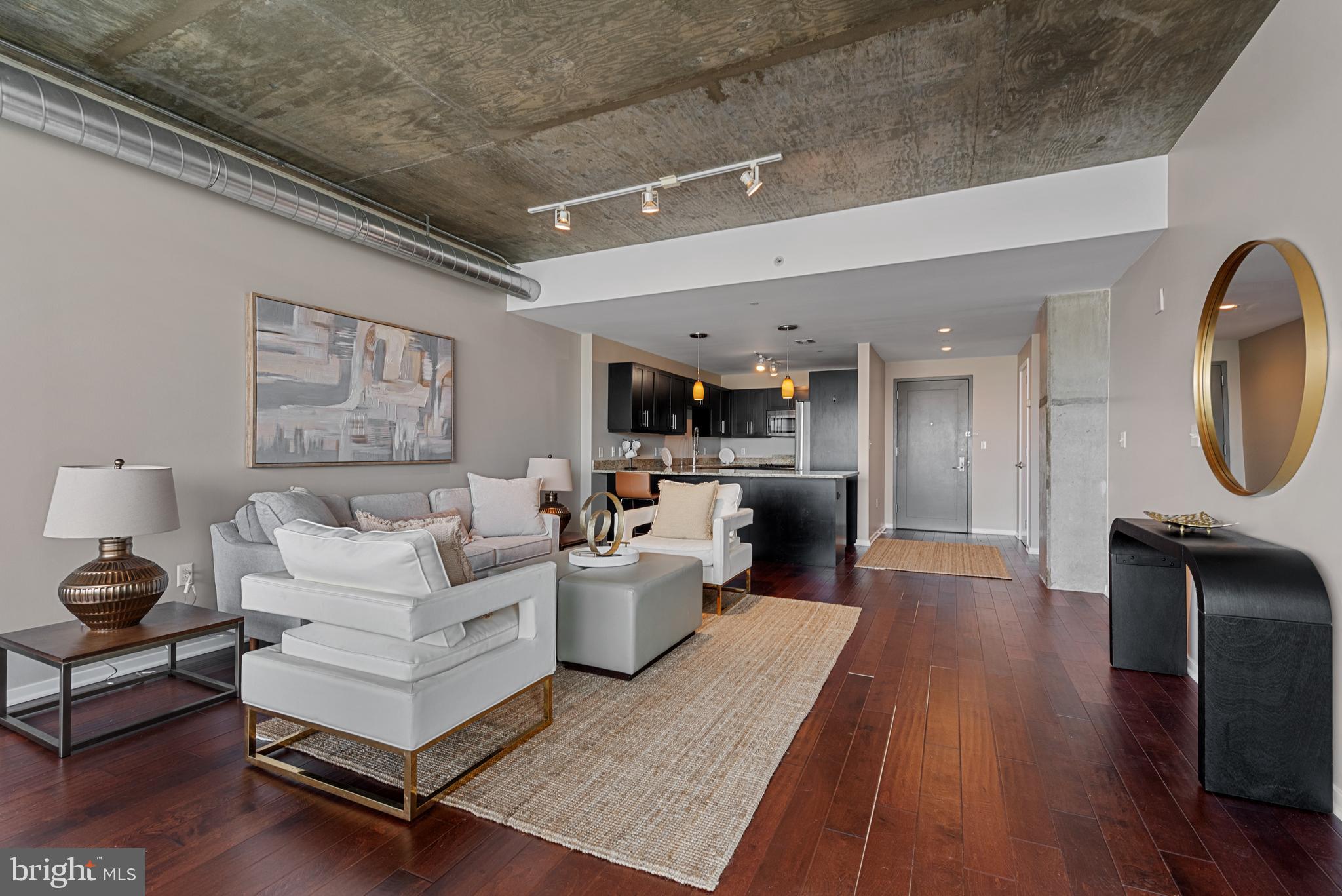 1200 Steuart Street, Unit 416 Baltimore, MD 21230 - Photo 15 of 37 a living room with furniture