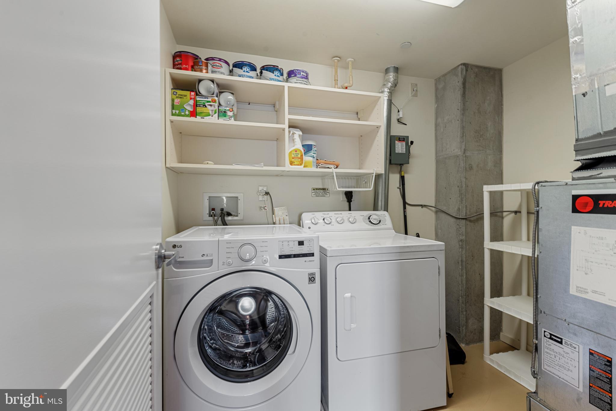 1200 Steuart Street, Unit 416 Baltimore, MD 21230 - Photo 25 of 37 a utility room with dryer and washer
