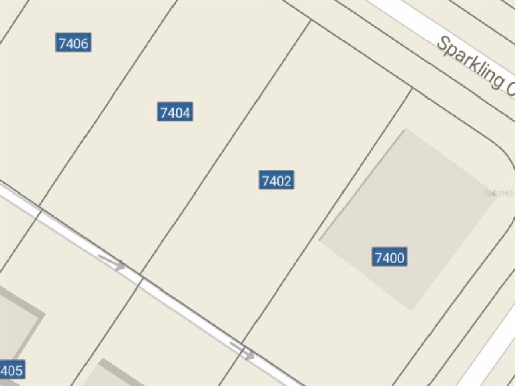 7402 Sparkling Court Reunion, FL 34747 - Photo 4 of 11 a view of a hallway with a white refrigerator