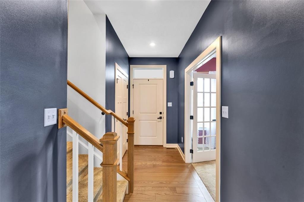 134 Woodsman Rdg Drive Harmony, PA 16037 - Photo 11 of 45 a view of an entryway with wooden floor and stairs