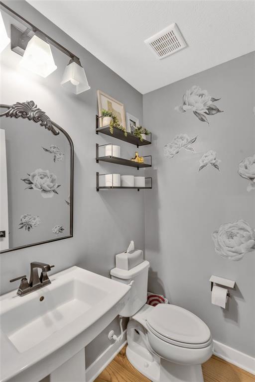 134 Woodsman Rdg Drive Harmony, PA 16037 - Photo 13 of 45 a bathroom with a sink mirror vanity and toilet