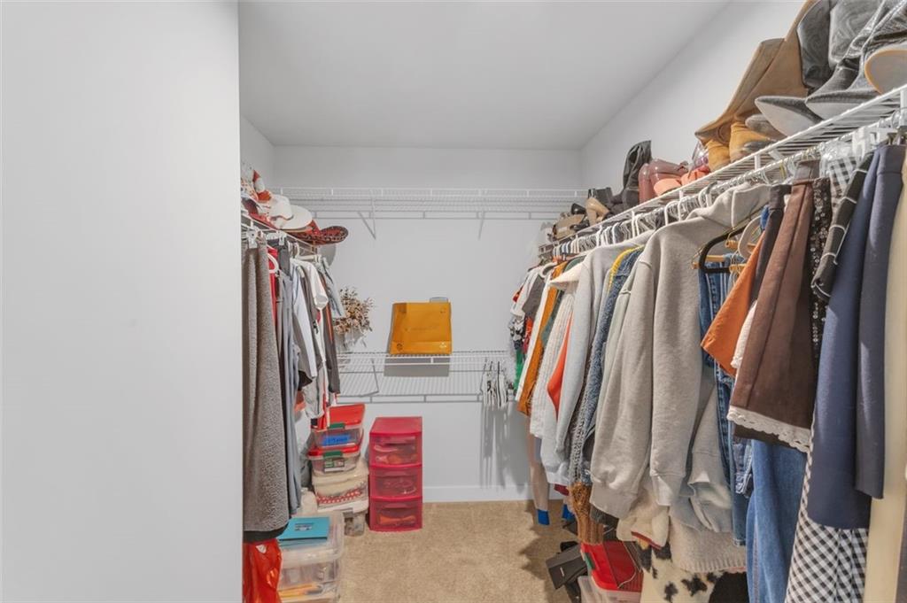 134 Woodsman Rdg Drive Harmony, PA 16037 - Photo 19 of 45 a view of walk in closet with clothes