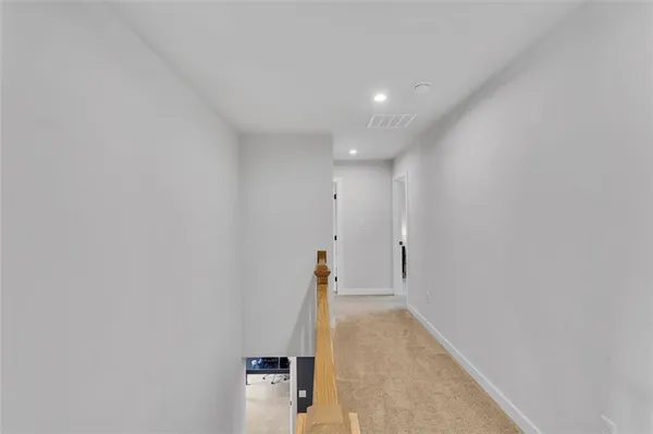 a view of hallway with stairs