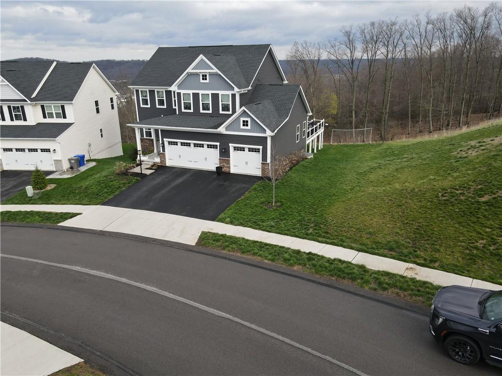 134 Woodsman Rdg Drive Harmony, PA 16037 - Photo 42 of 45 an aerial view of a house with a garden
