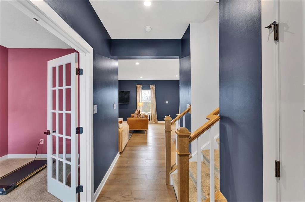 134 Woodsman Rdg Drive Harmony, PA 16037 - Photo 10 of 45 a view of a hallway with living room and furniture