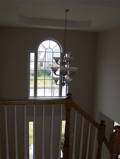 Dramatic Foyer with beautiful light fixt