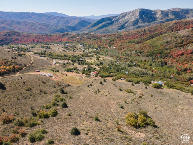 3378 Spring Way, Unit 410 Huntsville, UT 84317 - Photo 21 of 24 Expansive mountain terrain with visible building sites and established structures