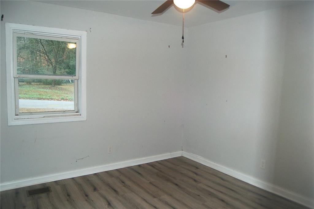 3421 Adkins Road Northwest Atlanta, GA 30331 - Photo 15 of 20 an empty room with a window