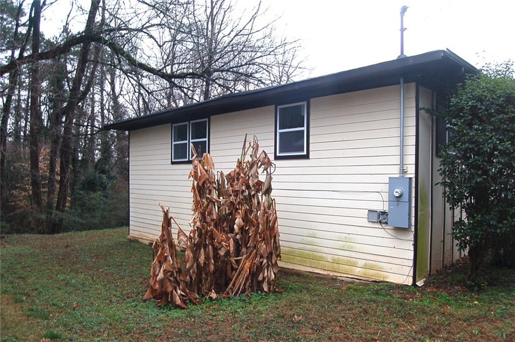 3421 Adkins Road Northwest Atlanta, GA 30331 - Photo 2 of 20 a view of a house with a yard