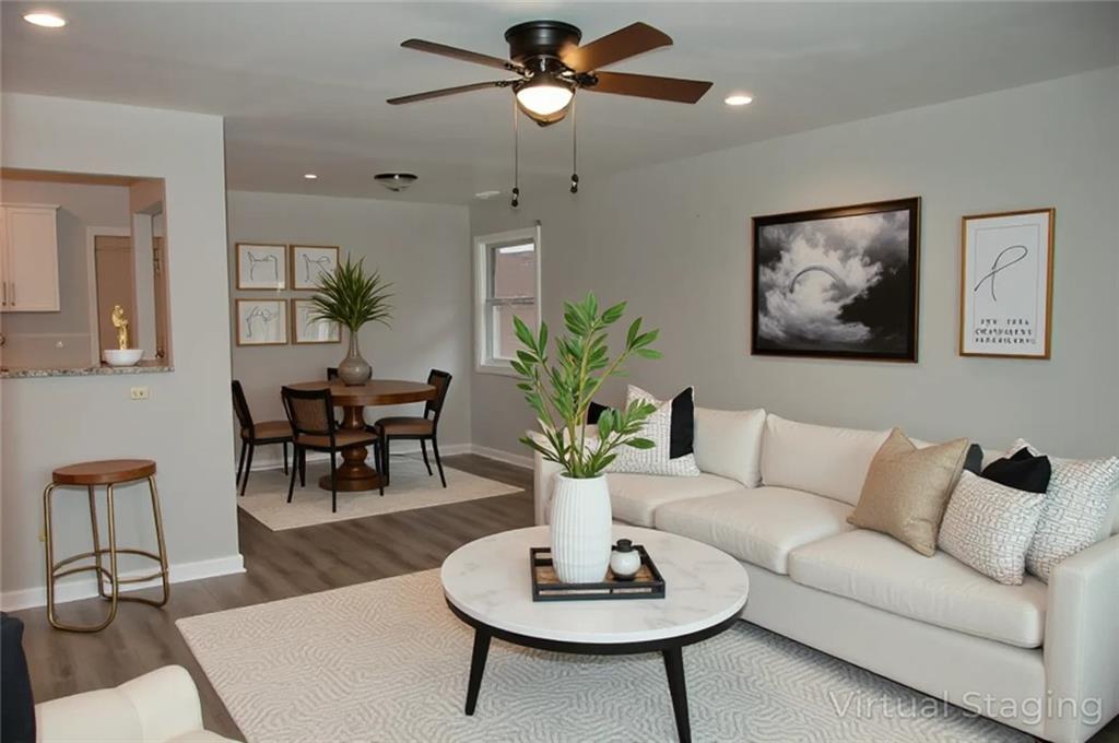 3421 Adkins Road Northwest Atlanta, GA 30331 - Photo 6 of 20 a living room with furniture potted plant and a lamp