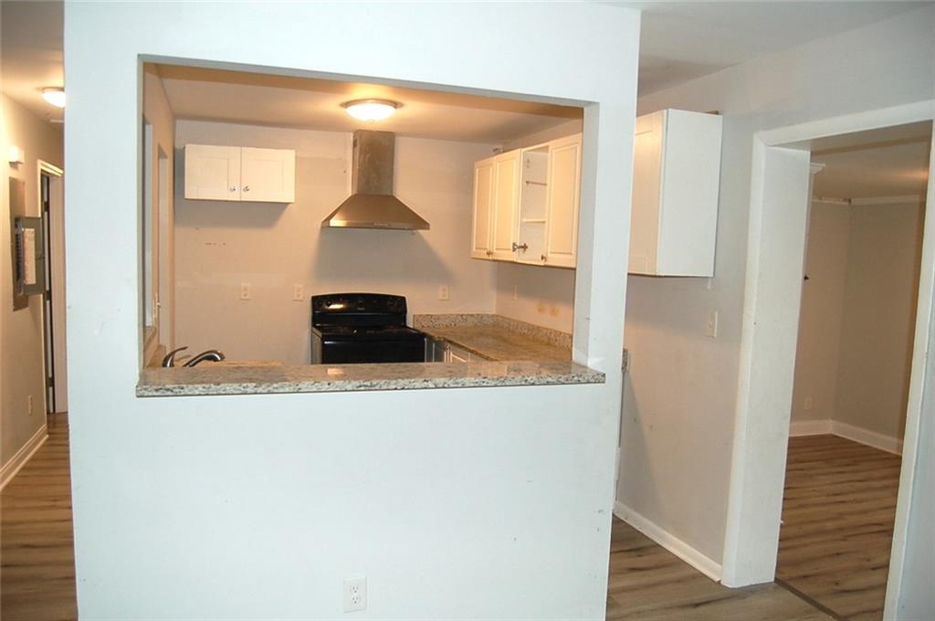 3421 Adkins Road Northwest Atlanta, GA 30331 - Photo 10 of 20 a bathroom with a sink and a mirror
