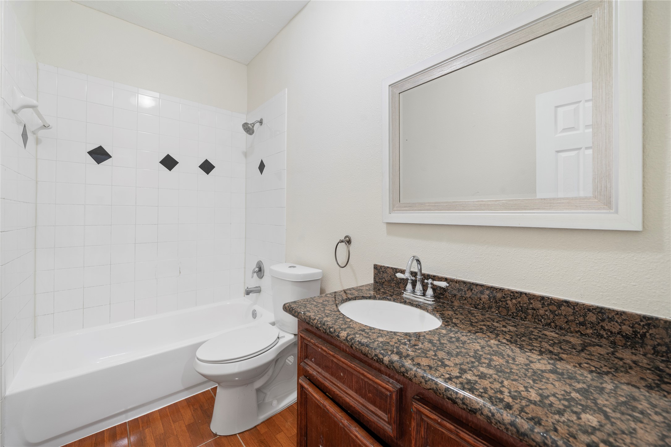 3001 Wayne Street Houston, TX 77026 - Photo 14 of 42 a bathroom with a granite countertop sink toilet and shower