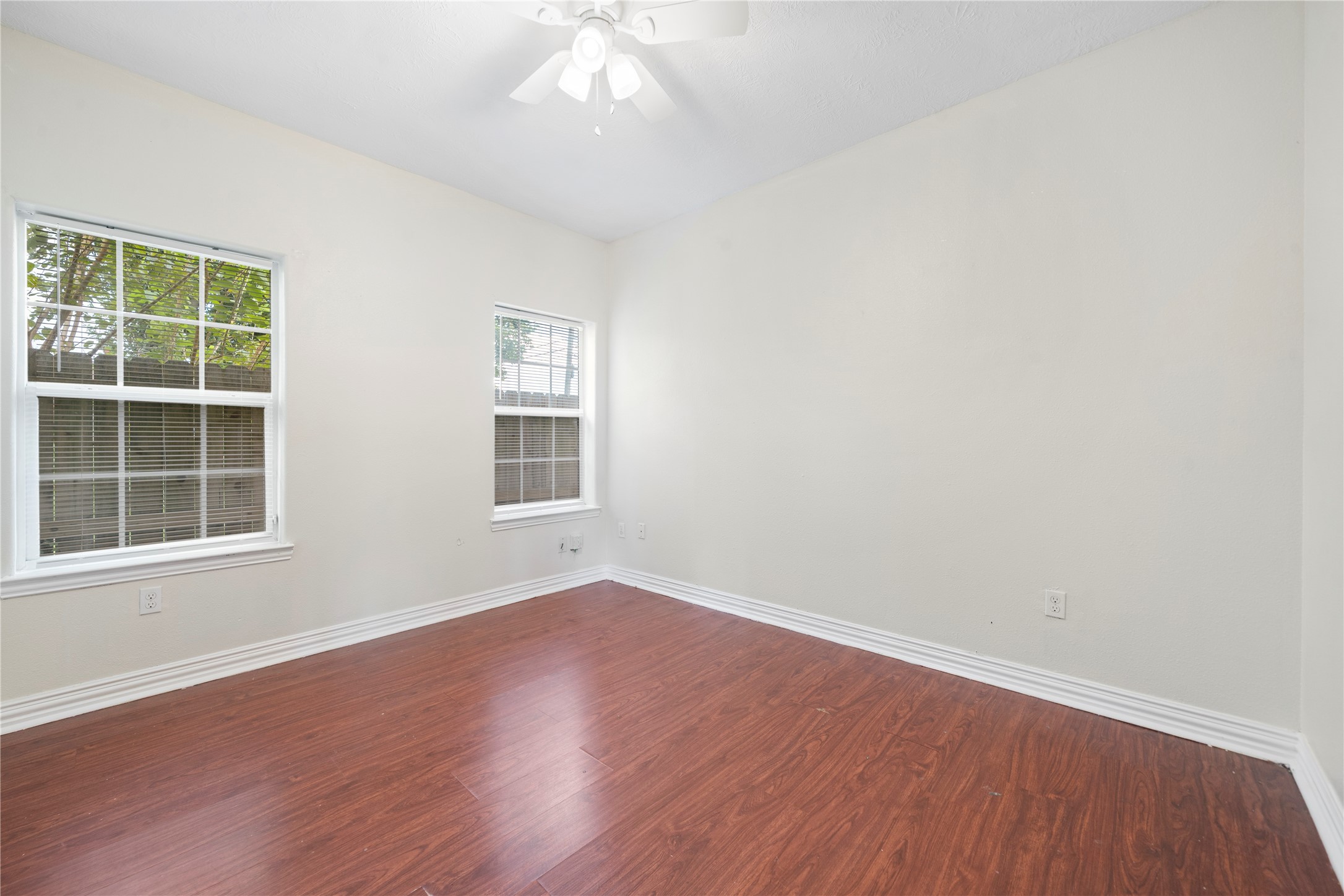 3001 Wayne Street Houston, TX 77026 - Photo 25 of 42 an empty room with wooden floor and windows