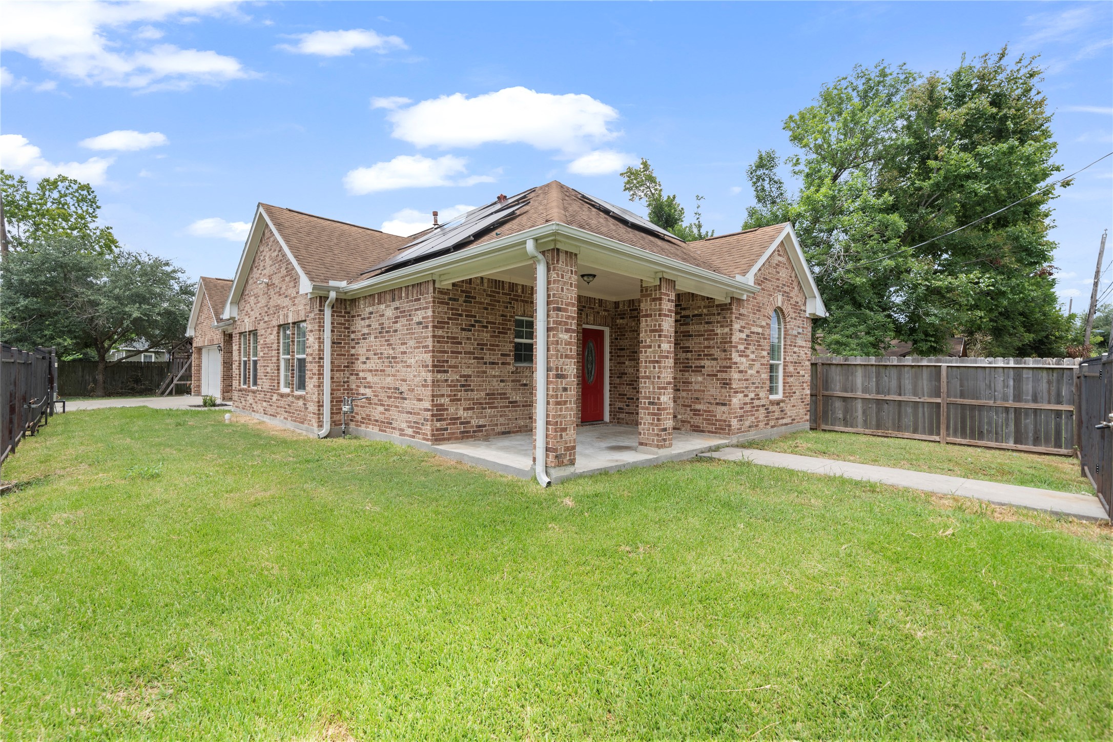 3001 Wayne Street Houston, TX 77026 - Photo 9 of 42 a view of a house with a yard and deck