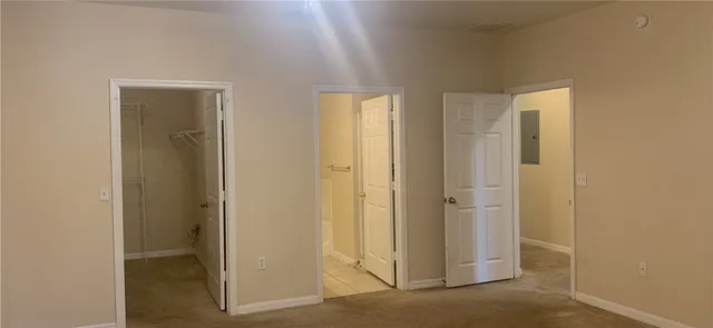 a view of a bathroom with a glass door