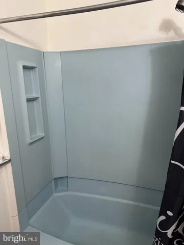 a bathroom with a bathtub