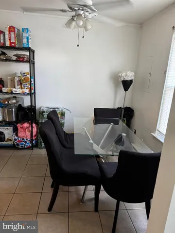 a view of a workspace with furniture