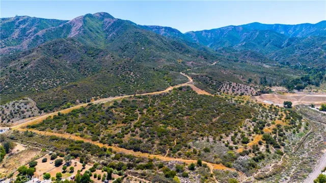 a view of a house with a mountain