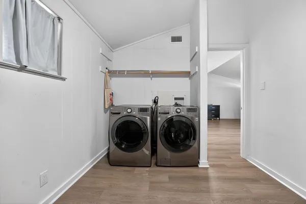a utility room with dryer and washer