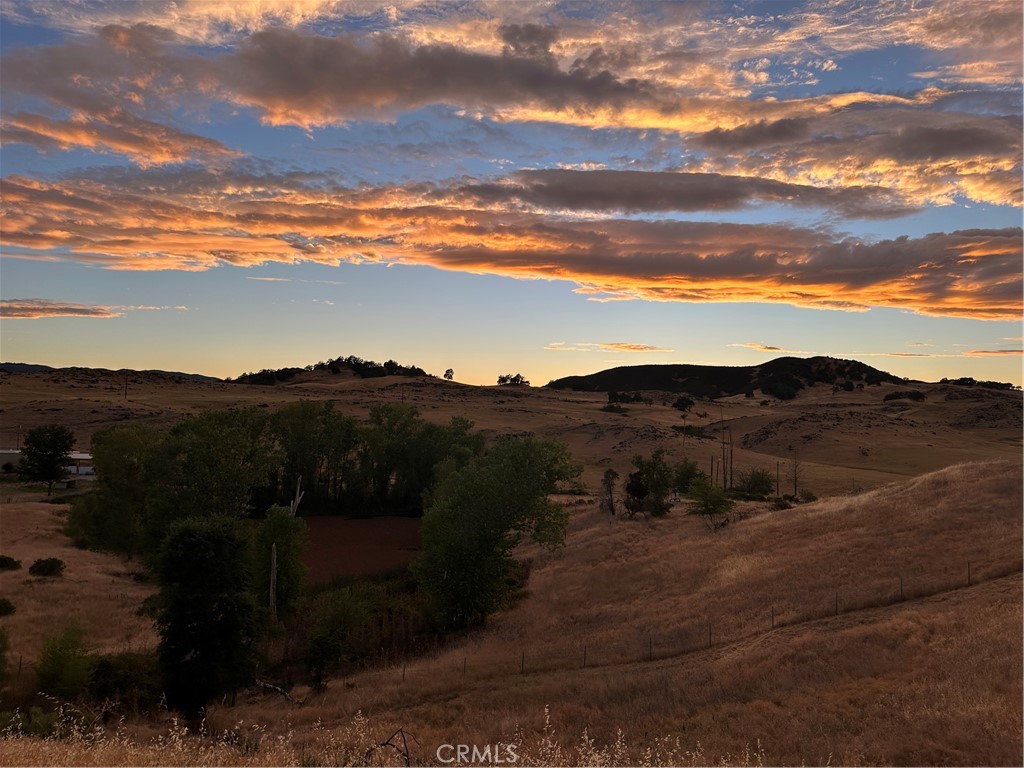 4378 Hill Road Lakeport, CA 95453 - Photo 37 of 38 a view of house with mountains in the background