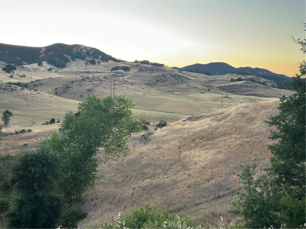 4378 Hill Road Lakeport, CA 95453 - Photo 5 of 38 a view of a dry field with mountains in the background