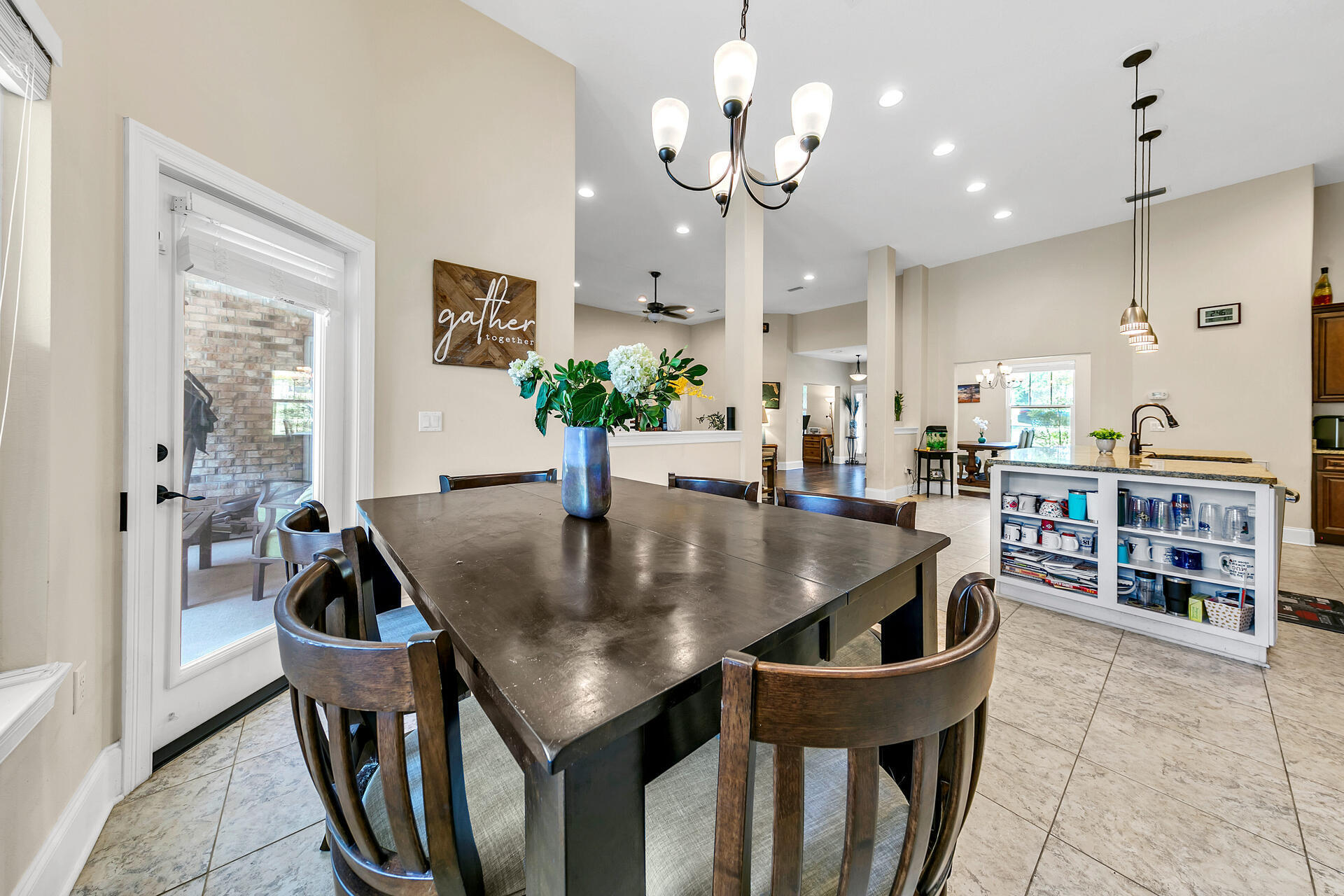 4078 Bond Circle Niceville, FL 32578 - Photo 12 of 37 a kitchen with a table chairs and entryway