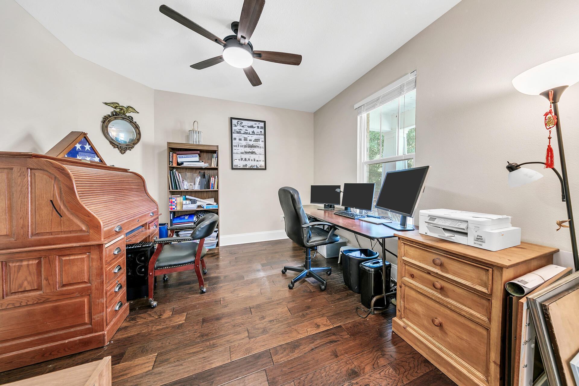 4078 Bond Circle Niceville, FL 32578 - Photo 14 of 37 a view of a workspace with furniture and a window