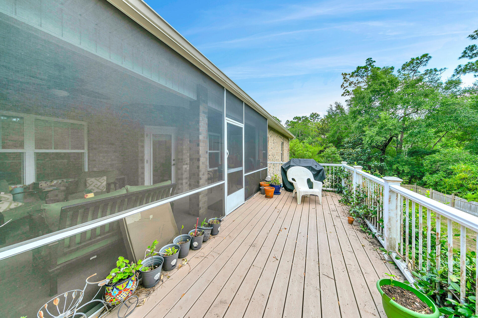 4078 Bond Circle Niceville, FL 32578 - Photo 30 of 37 a balcony with wooden floor