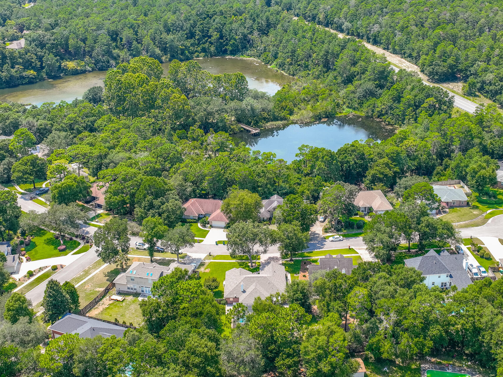 4078 Bond Circle Niceville, FL 32578 - Photo 37 of 37 a view of a lake with a house